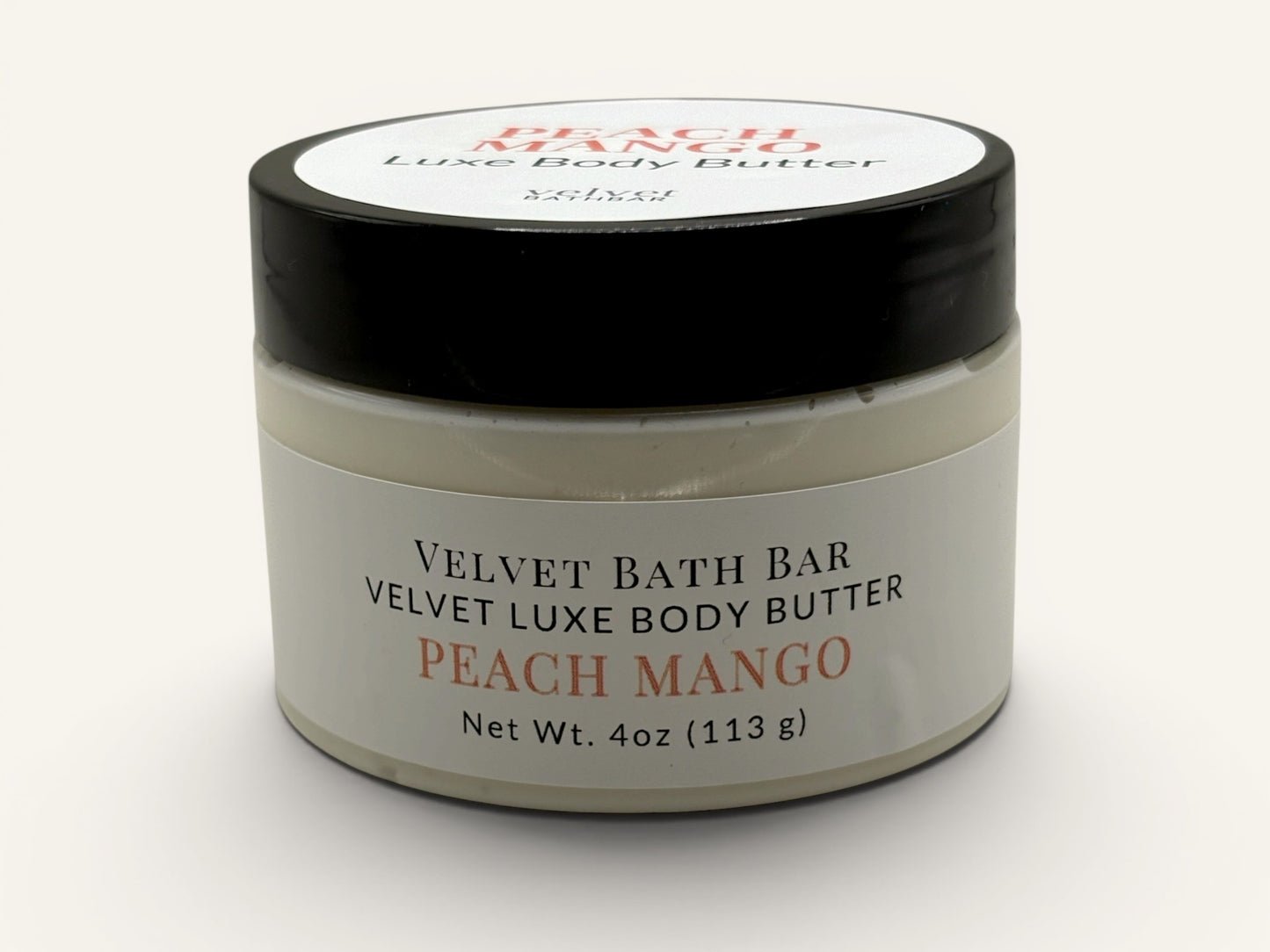 Velvet Bath Bar Peach Mango Velvet Luxe Body Butter in a white jar with a black lid. 4oz.