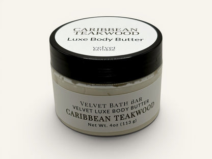 Velvet Bath Bar Caribbean Teakwood Luxe Body Butter in a clear jar with a black lid. Net Wt. 4oz.