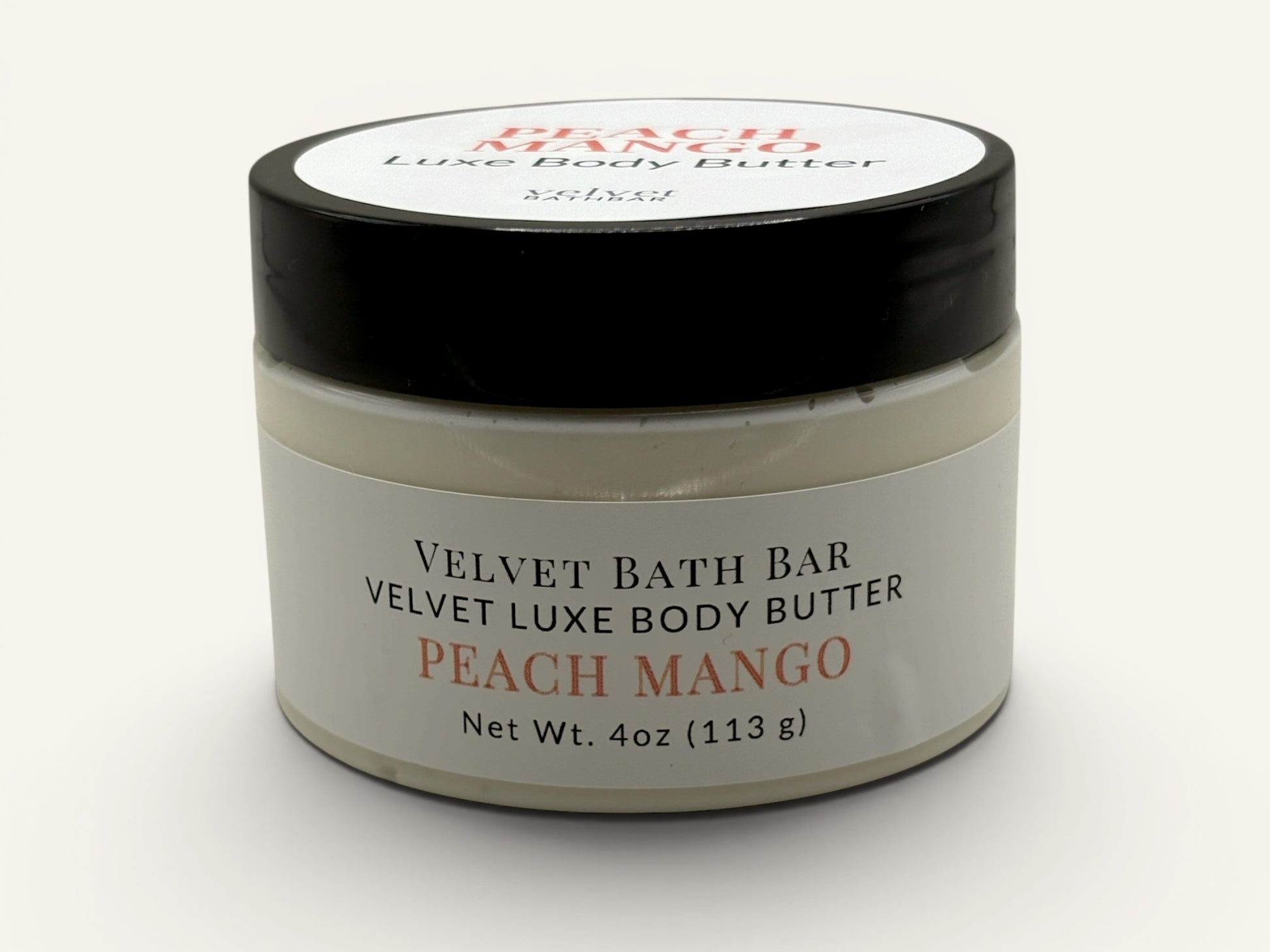 Velvet Bath Bar Peach Mango Velvet Luxe Body Butter in a white jar with a black lid. 4oz.