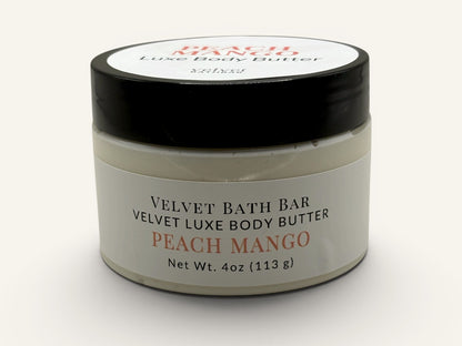 Velvet Bath Bar Peach Mango Velvet Luxe Body Butter in a white jar with a black lid. 4oz.