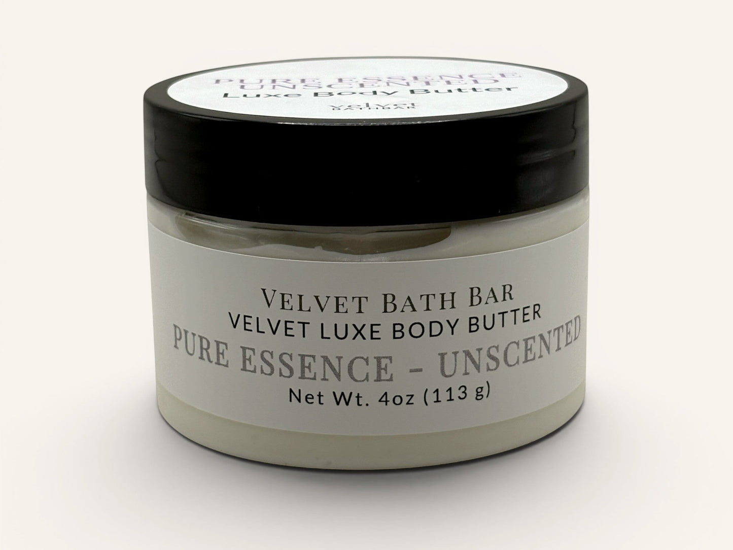 Velvet Bath Bar Pure Essence Unscented Velvet Luxe Body Butter in a clear jar with a black lid. Net Wt. 4oz.