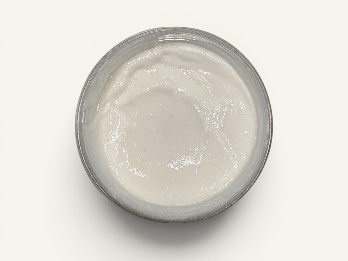 Velvet Bath Bar Velvet Escape body butter in a clear jar, creamy white texture.